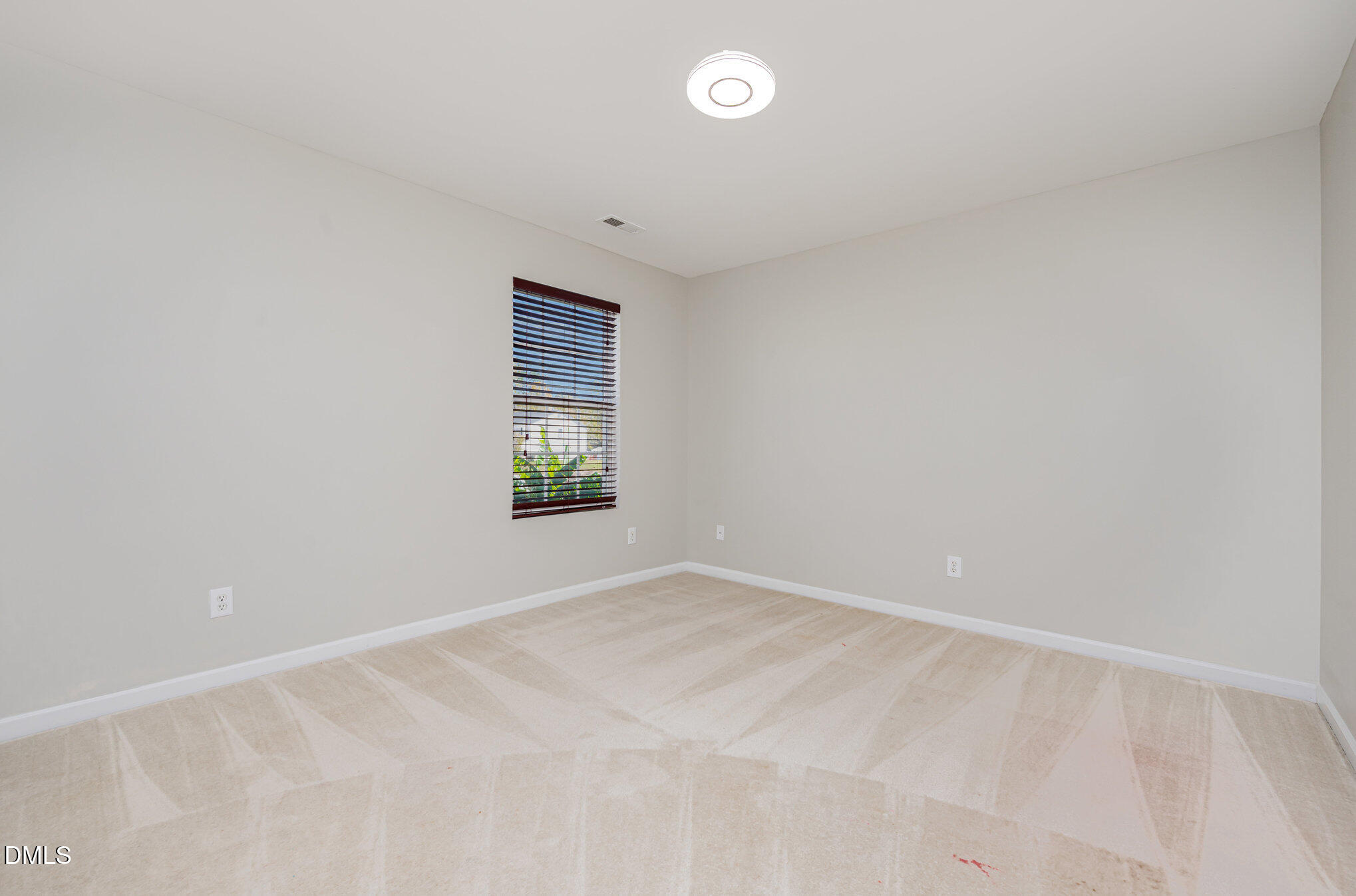 1508 Bancroft Court Graham, NC 27253 - Photo 26 of 33 an empty room with windows