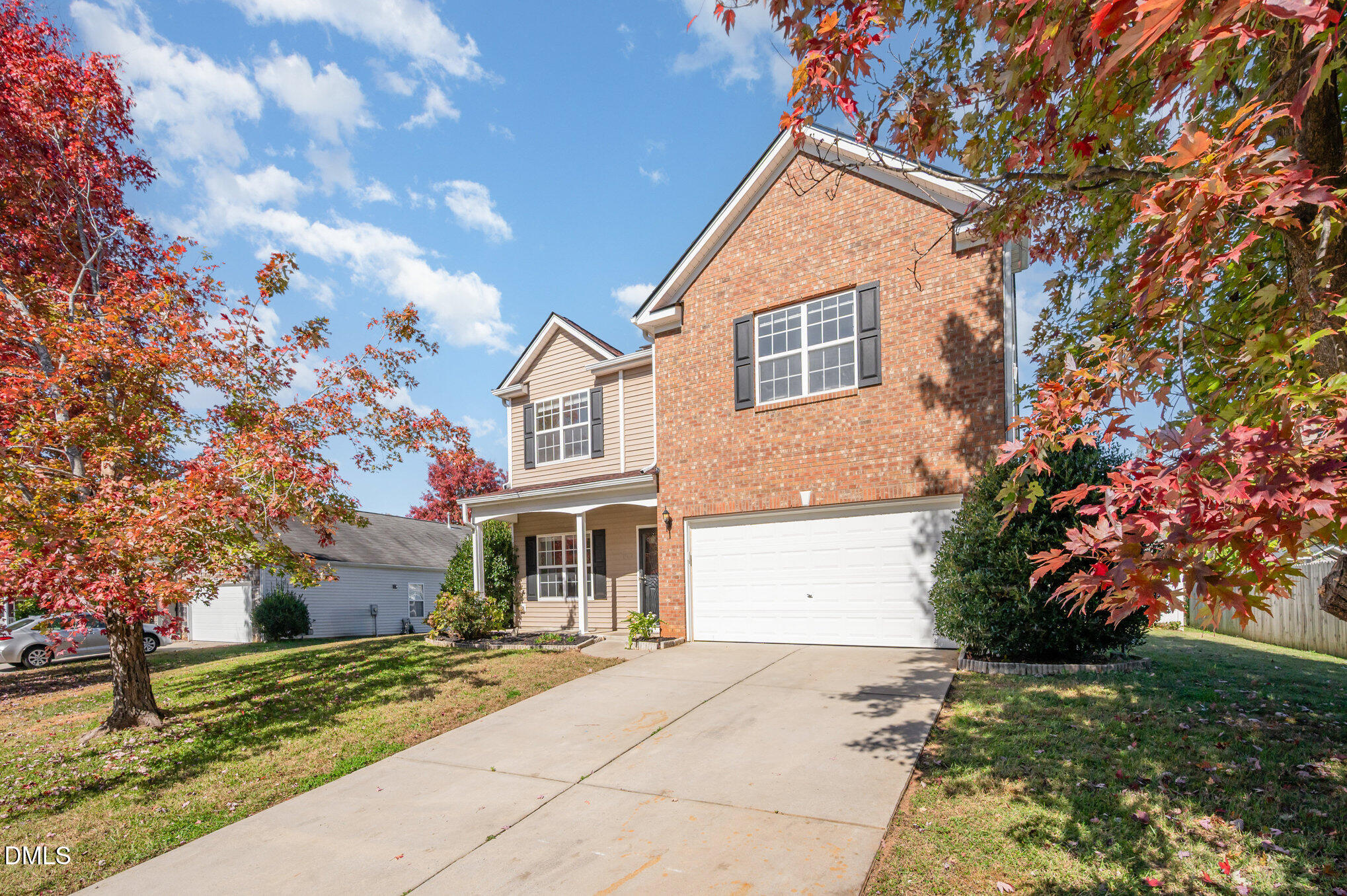 1508 Bancroft Court Graham, NC 27253 - Photo 2 of 33 a front view of a house with garden