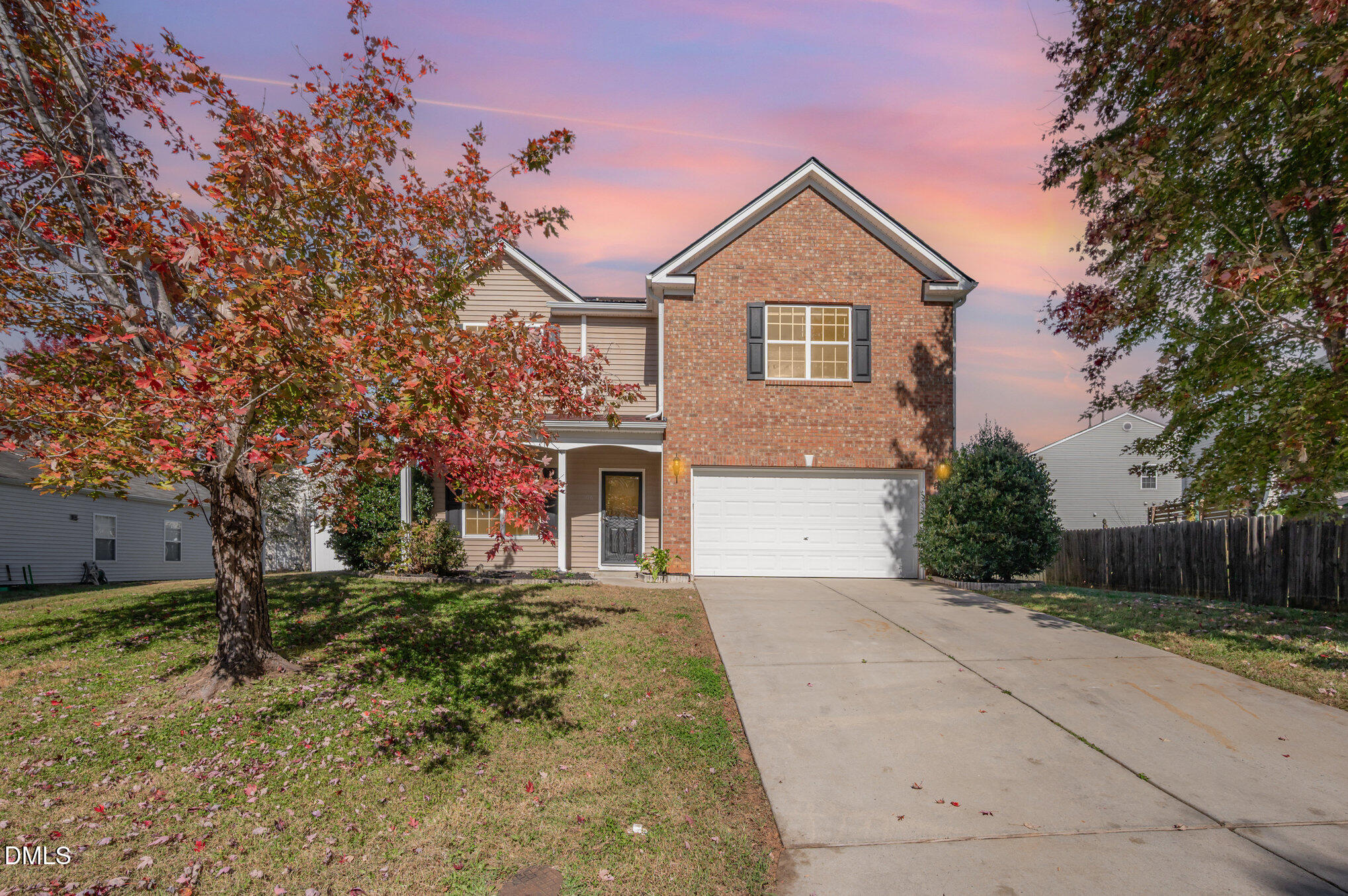 1508 Bancroft Court Graham, NC 27253 - Photo 31 of 33 a front view of a house with a yard and garage