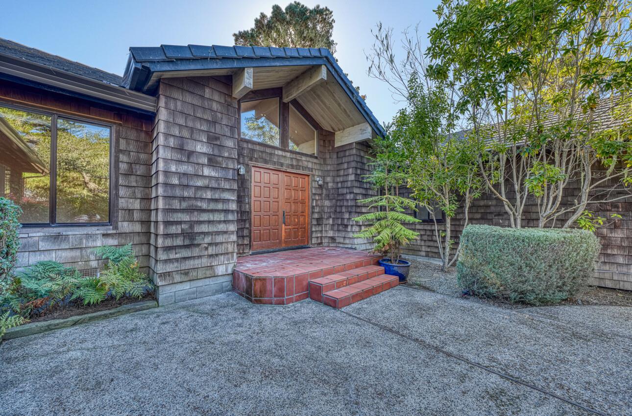 1056 Rodeo Road Pebble Beach, CA 93953 - Photo 5 of 17 a view of backyard with outdoor seating and plants