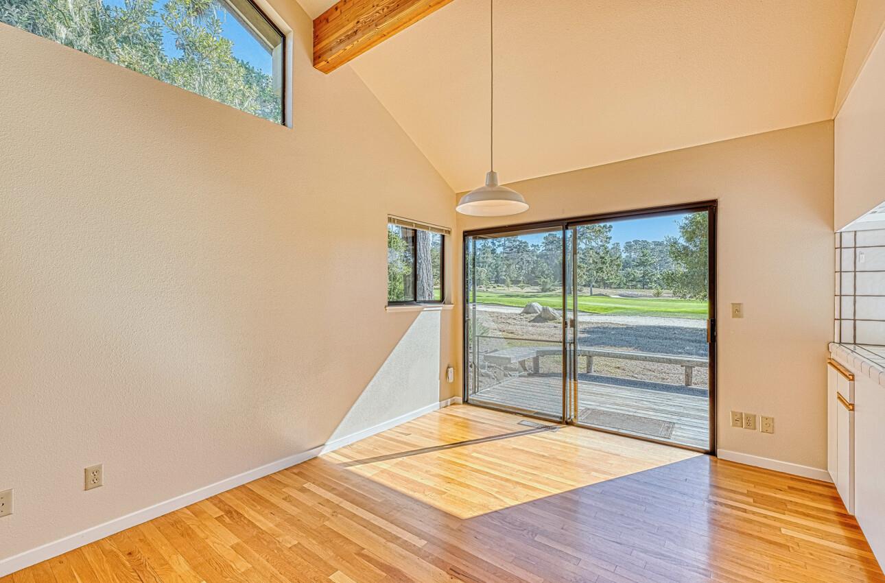 1056 Rodeo Road Pebble Beach, CA 93953 - Photo 9 of 17 a view of a room with wooden floor and iron stairs