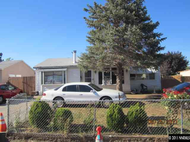 1425 Castle Way Reno, NV 89512 - Photo 1 of 7 a front view of a house with a yard