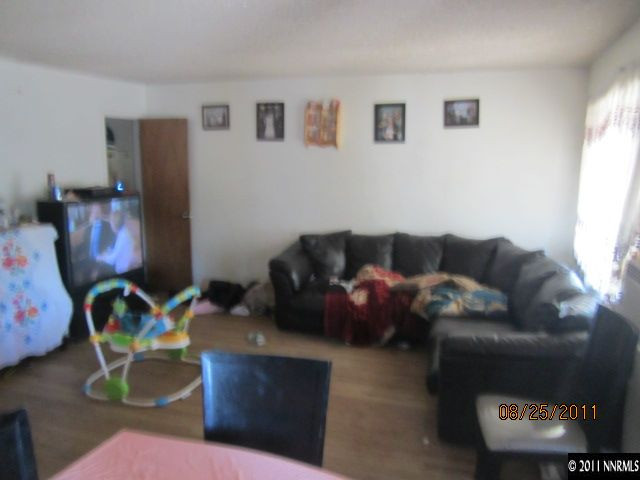 1425 Castle Way Reno, NV 89512 - Photo 6 of 7 a living room with furniture and wooden floor