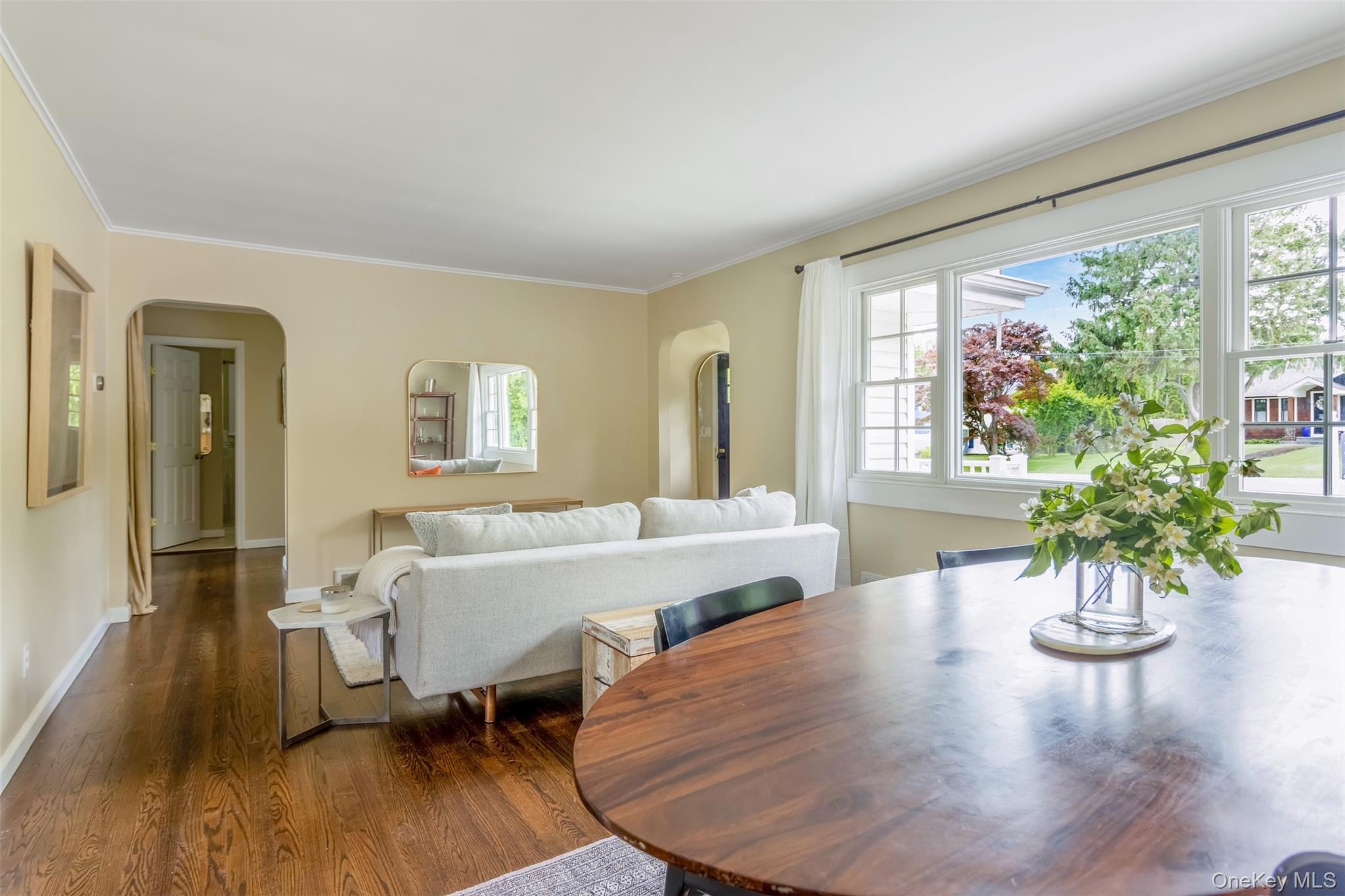 315 Wicks Road New Suffolk, NY 11956 - Photo 8 of 28 a view of a dining room with furniture window and wooden floor