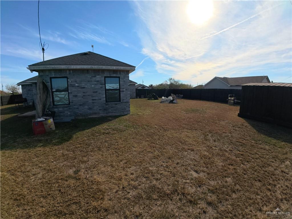 321 Gladiola Drive Edcouch, TX 78538 - Photo 23 of 29 a front view of a house with a yard