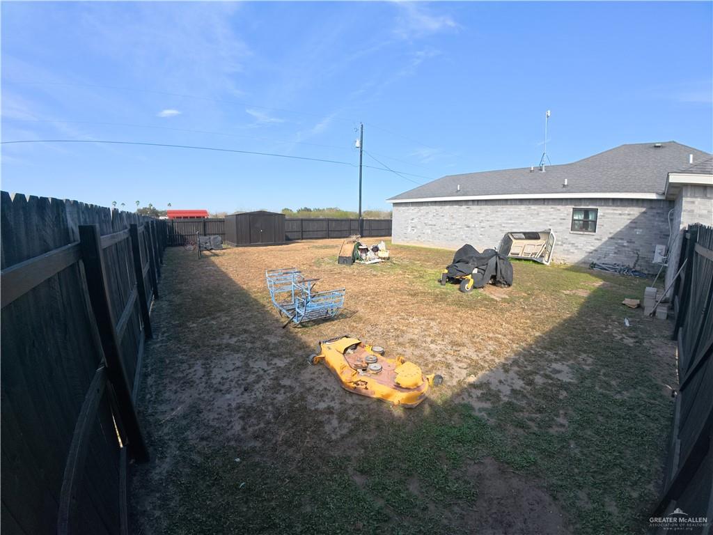 321 Gladiola Drive Edcouch, TX 78538 - Photo 24 of 29 a view of a house with backyard and sitting area