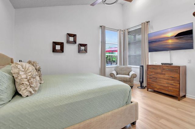 a bedroom with a bed and furniture