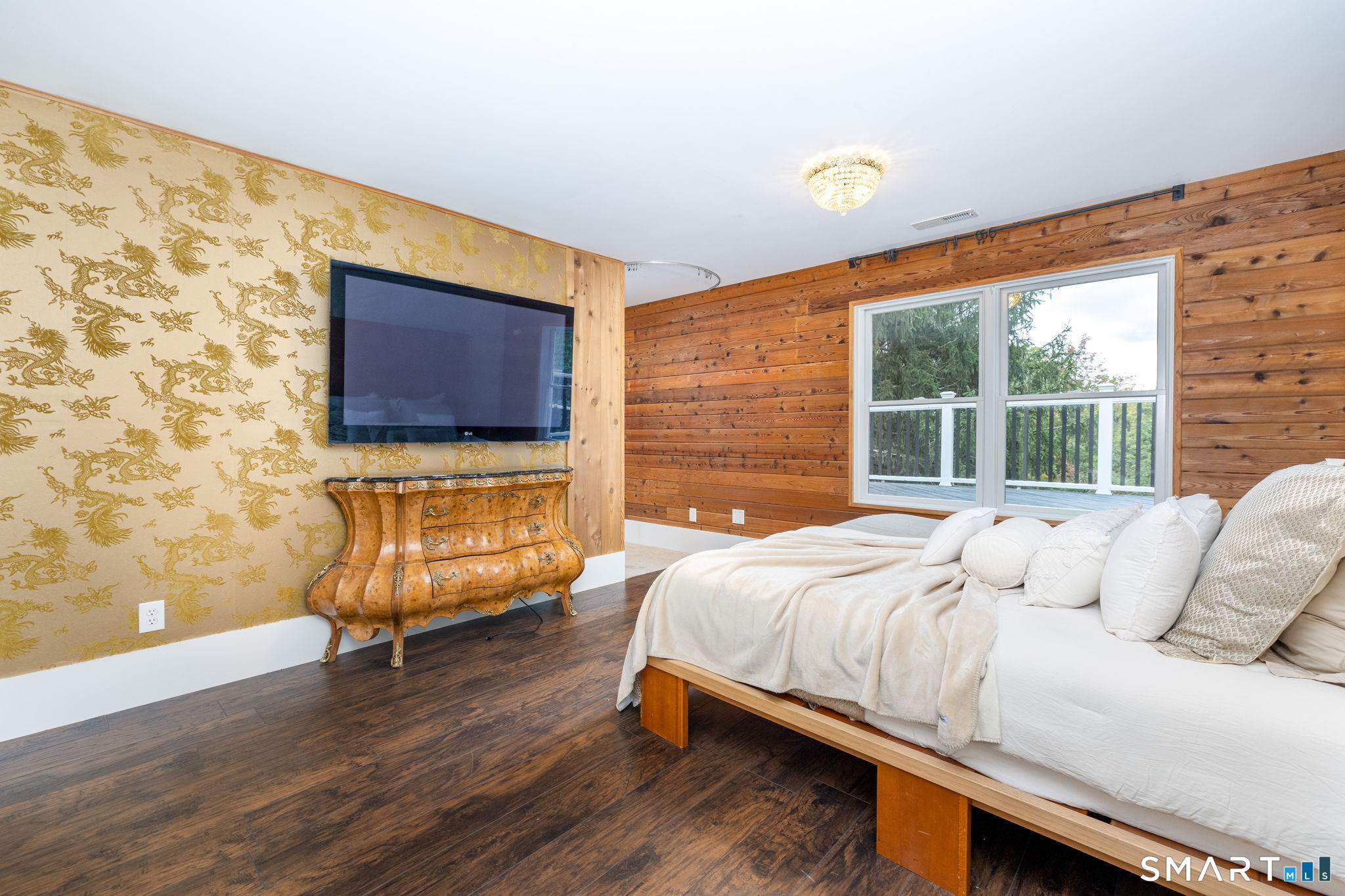 695 Spindle Hill Road Wolcott, CT 06716 - Photo 24 of 40 An expansive, open-concept primary retreat ready for final custom finishes, with private access to the sun-drenched, open-air cedar deck.