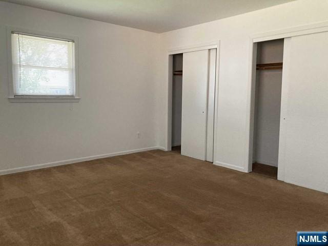 2430 6th Street, Unit 2 Fort Lee, NJ 07024 - Photo 12 of 15 an empty room with windows and closet