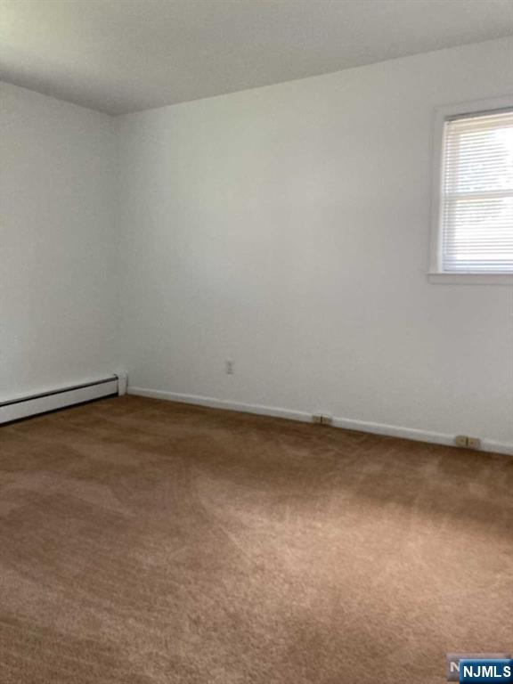 2430 6th Street, Unit 2 Fort Lee, NJ 07024 - Photo 13 of 15 an empty room with a window