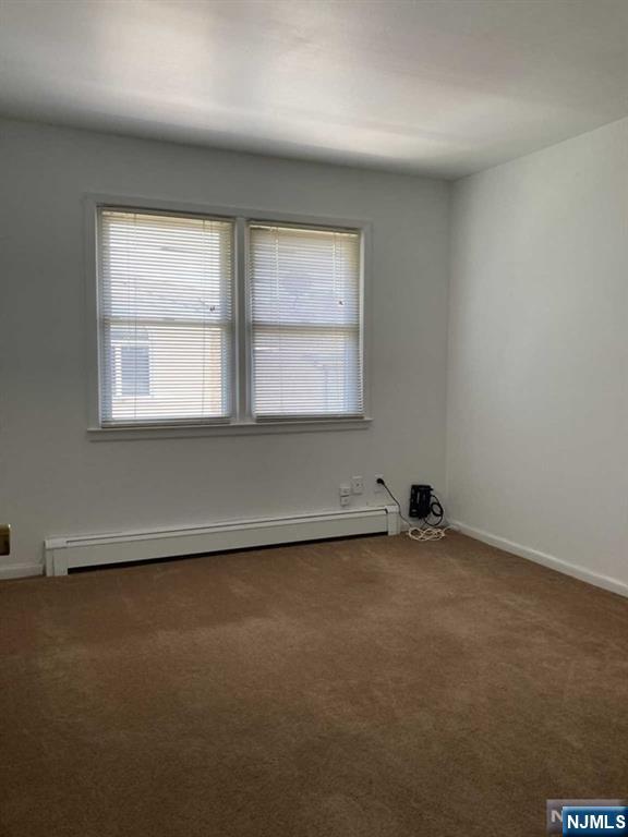 2430 6th Street, Unit 2 Fort Lee, NJ 07024 - Photo 14 of 15 an empty room with a window