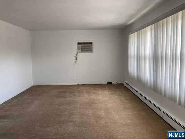 2430 6th Street, Unit 2 Fort Lee, NJ 07024 - Photo 5 of 15 an empty room with windows