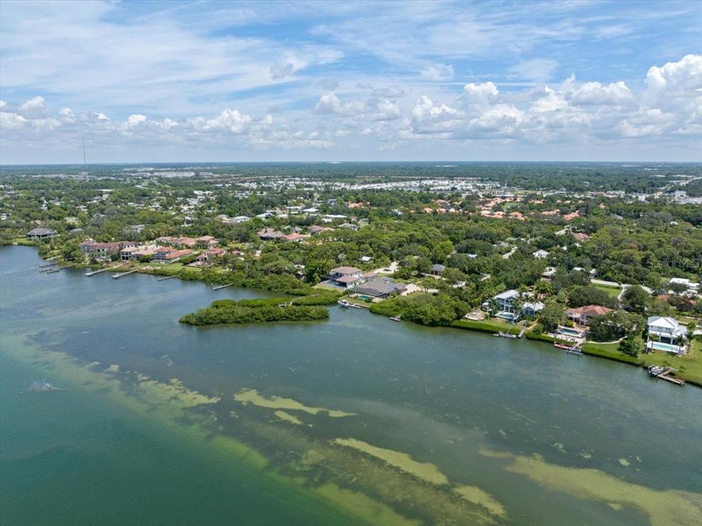 Bayshore Road Nokomis, FL 34275 - Photo 11 of 42 an aerial view of residential houses with outdoor space and trees