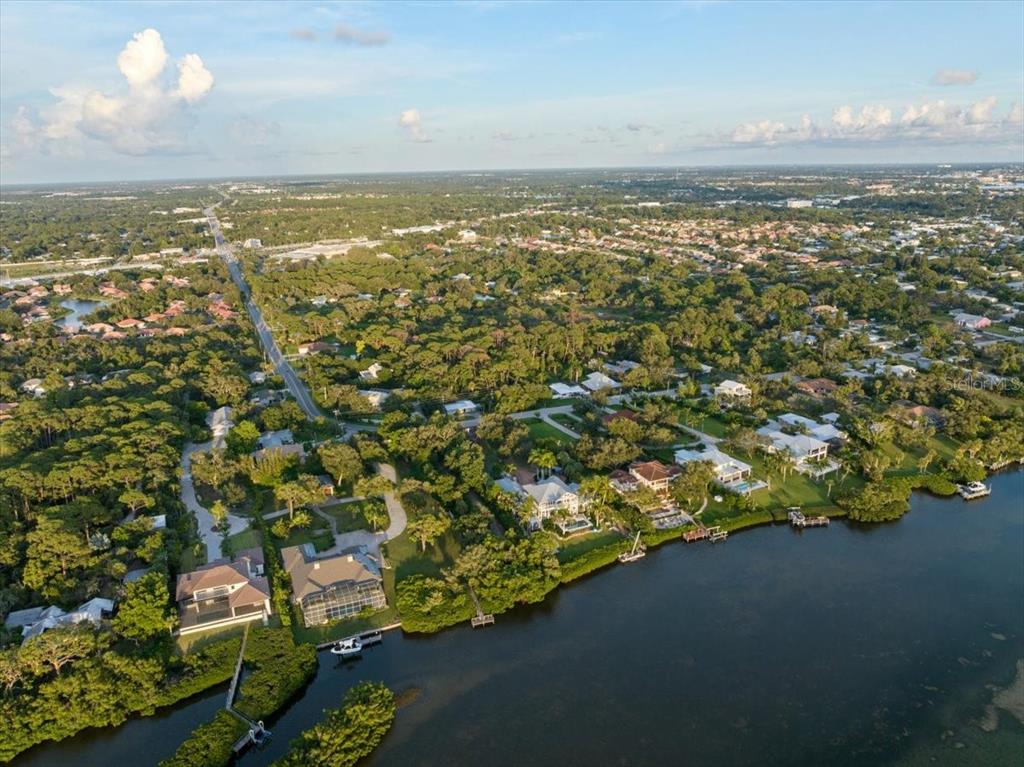 Bayshore Road Nokomis, FL 34275 - Photo 13 of 42 an aerial view of residential houses with outdoor space and trees