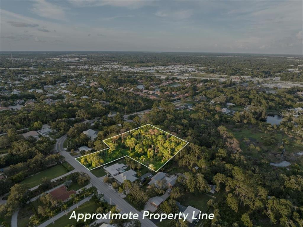 Bayshore Road Nokomis, FL 34275 - Photo 3 of 42 an aerial view of a house