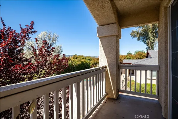 a balcony view with an outdoor space