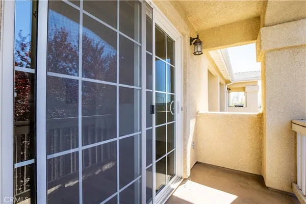 a view of a livingroom with wooden floor