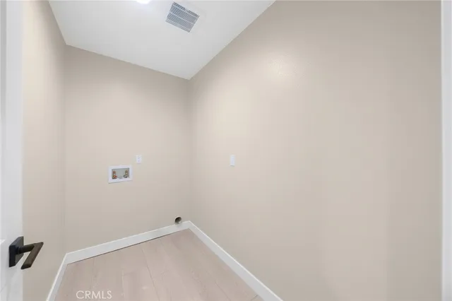 a view of a backyard with sitting area