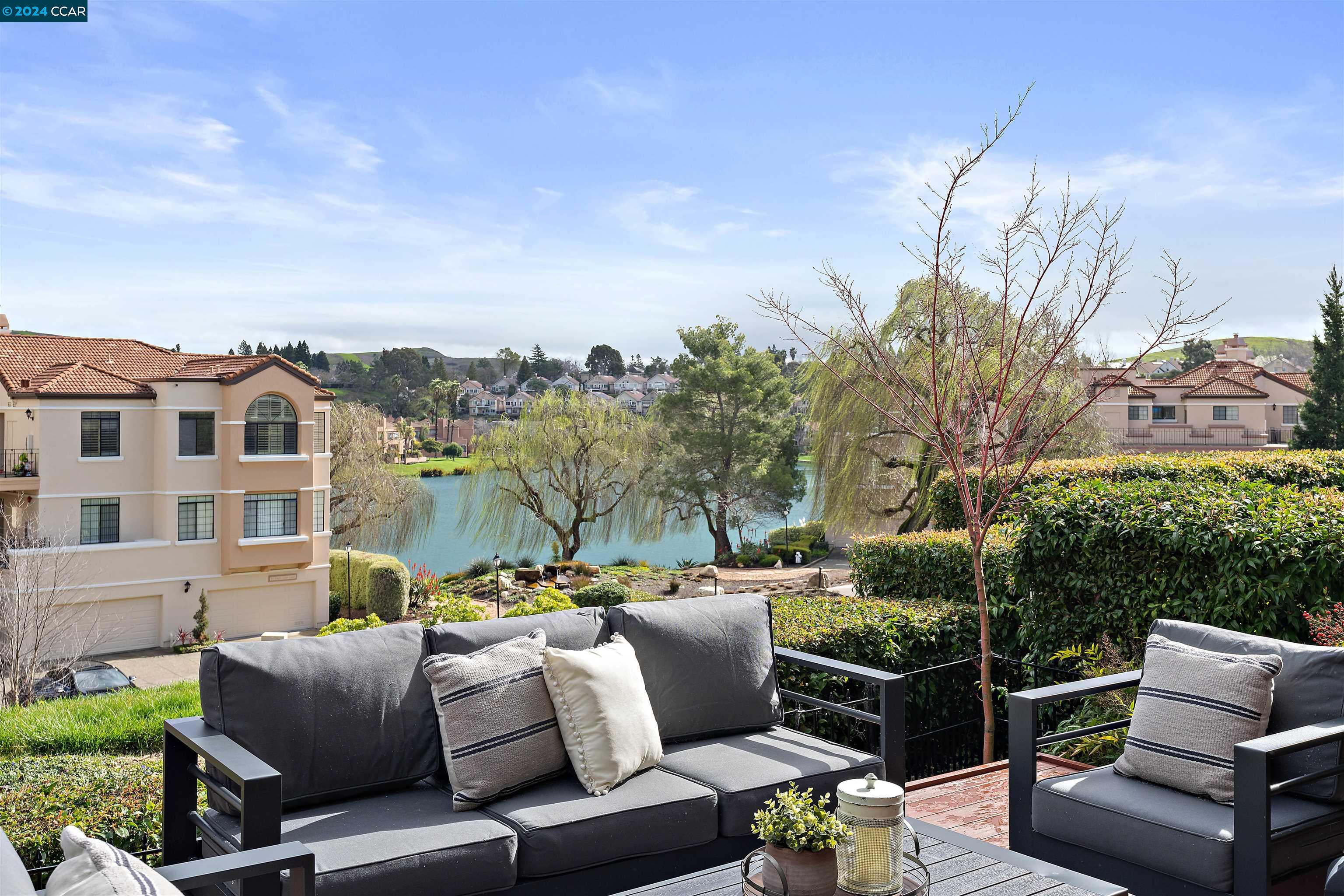41 Eagle Lake Court, Unit 11 San Ramon, CA 94582 - Photo 1 of 1 a view of roof deck with couches and potted plants