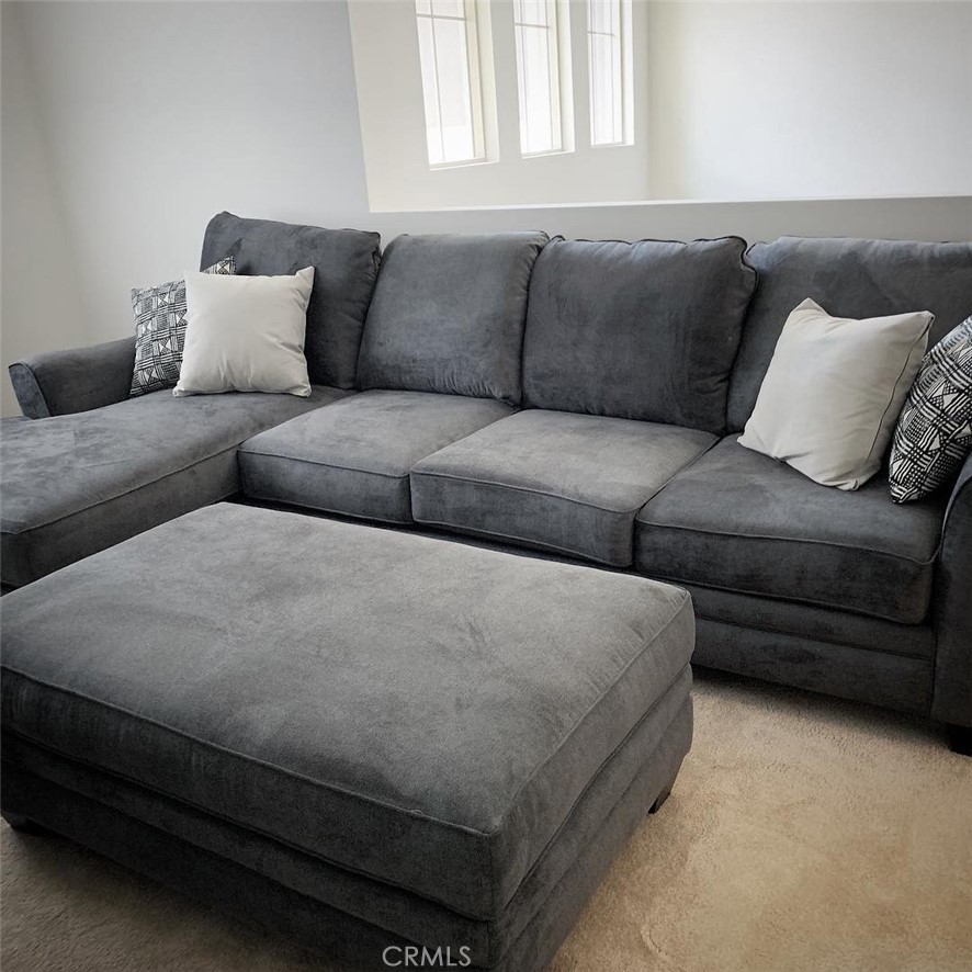 2017 Tango Loop, Unit 1 Chula Vista, CA 91915 - Photo 13 of 32 a living room with furniture and a couch