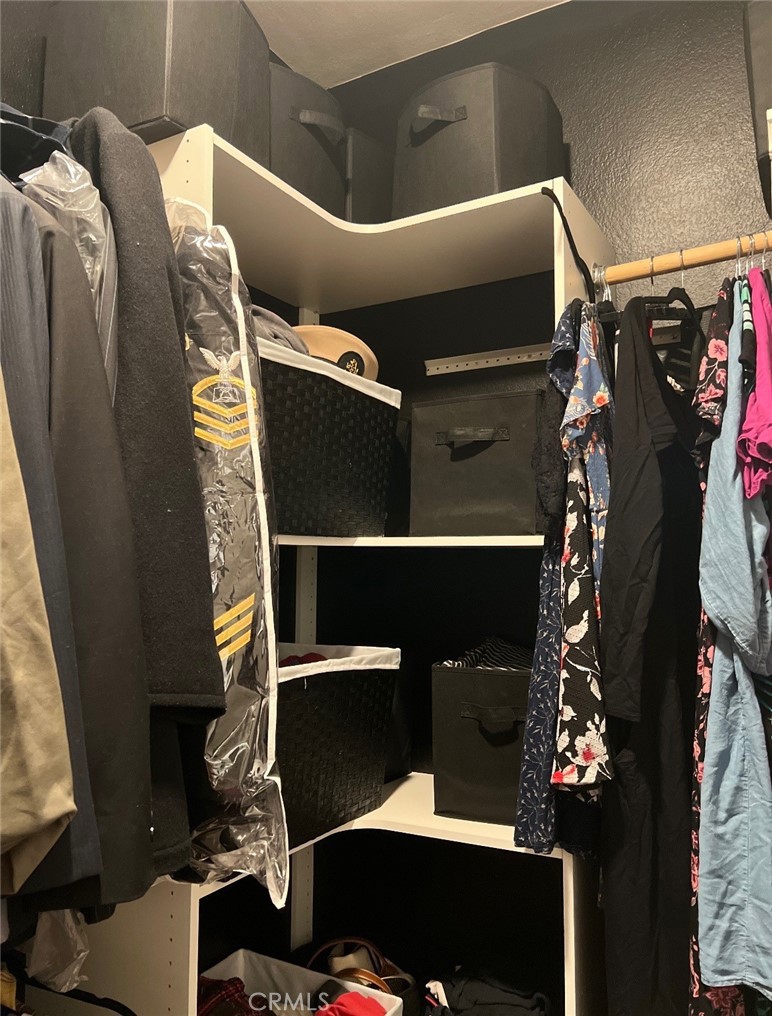 2017 Tango Loop, Unit 1 Chula Vista, CA 91915 - Photo 15 of 32 a view of walk in closet with clothes and shoes