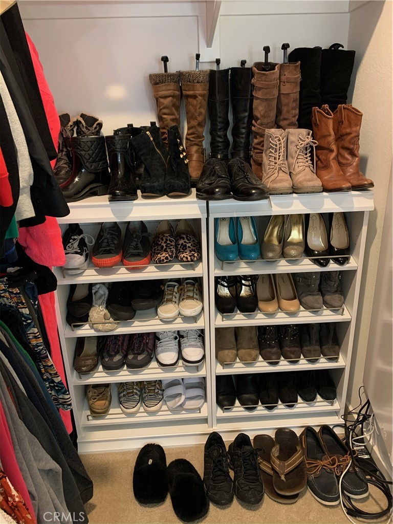 2017 Tango Loop, Unit 1 Chula Vista, CA 91915 - Photo 19 of 32 a kitchen with lots of different colored cloths
