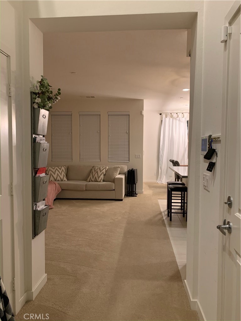 2017 Tango Loop, Unit 1 Chula Vista, CA 91915 - Photo 23 of 32 a living room with furniture and a fireplace