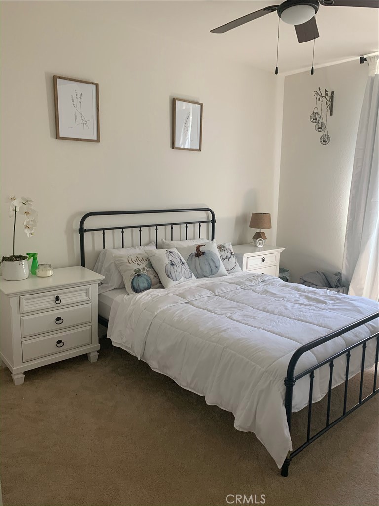 2017 Tango Loop, Unit 1 Chula Vista, CA 91915 - Photo 25 of 32 a bedroom with a bed and a window