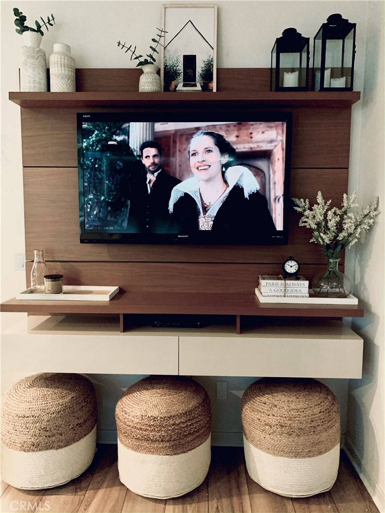 2017 Tango Loop, Unit 1 Chula Vista, CA 91915 - Photo 4 of 32 a front view of a fireplace with wooden wall