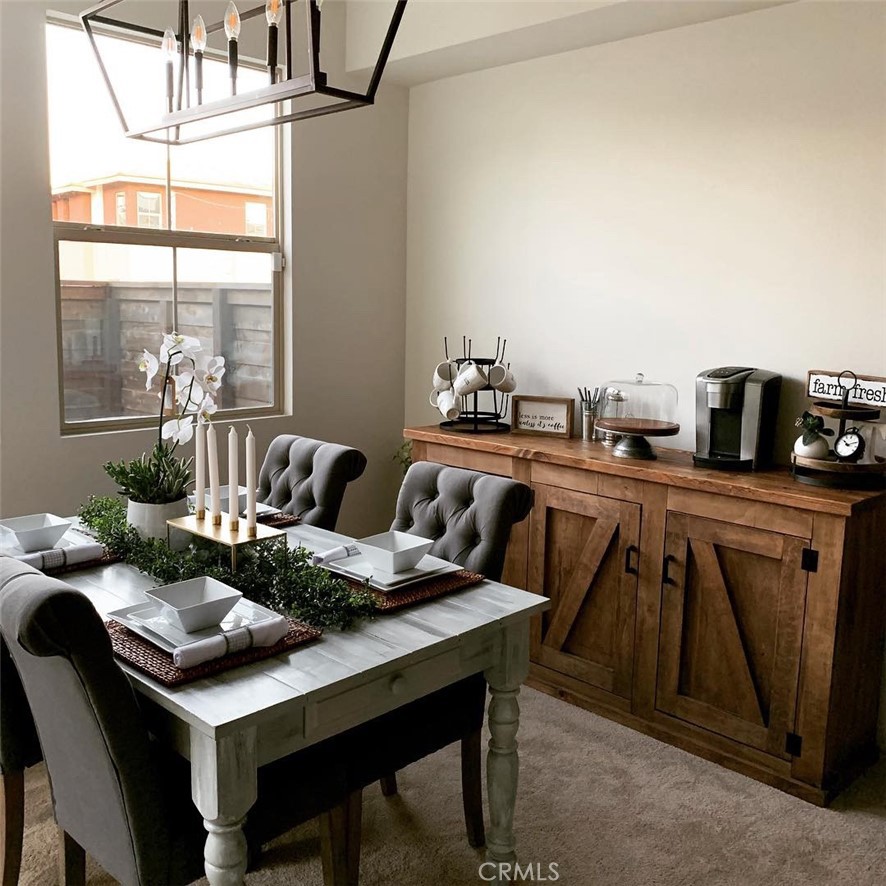 2017 Tango Loop, Unit 1 Chula Vista, CA 91915 - Photo 6 of 32 a living room with furniture and a table