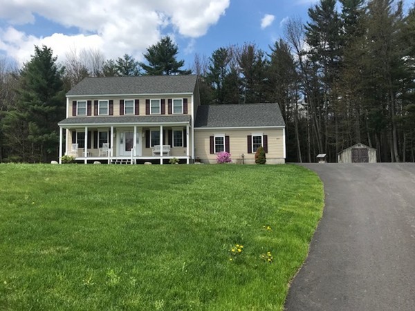 487 Sheldon Road Fitchburg, MA 01420 - Photo 1 of 27 a front view of a house with a garden