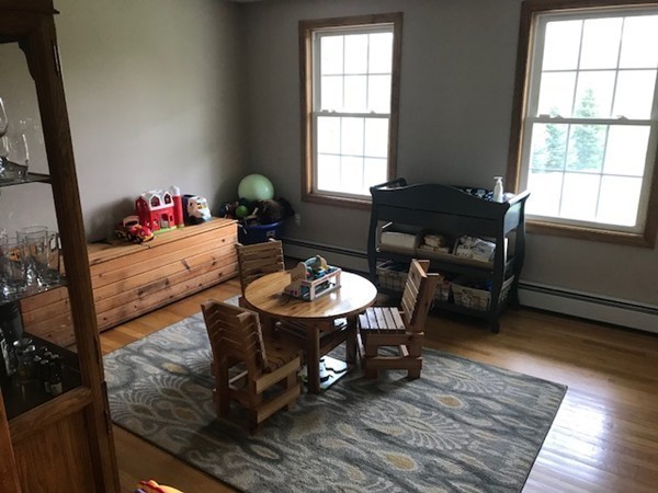 487 Sheldon Road Fitchburg, MA 01420 - Photo 18 of 27 a living room with furniture and a window