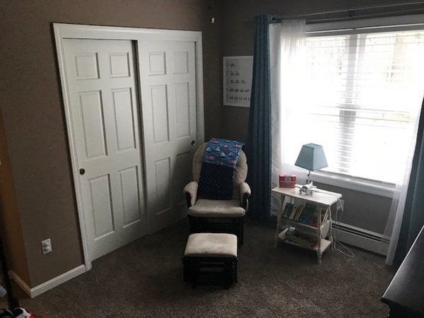 487 Sheldon Road Fitchburg, MA 01420 - Photo 21 of 27 a room with chair and window
