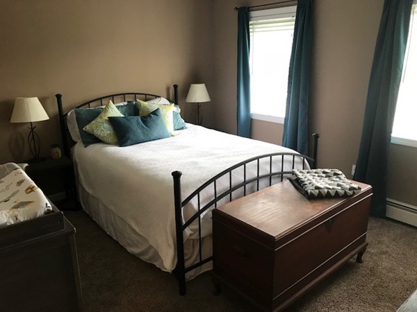 487 Sheldon Road Fitchburg, MA 01420 - Photo 24 of 27 a bedroom with a bed and window