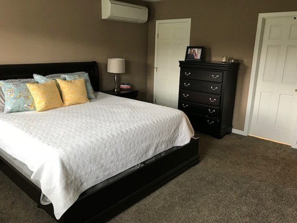 487 Sheldon Road Fitchburg, MA 01420 - Photo 26 of 27 a bedroom with a bed and a night stand