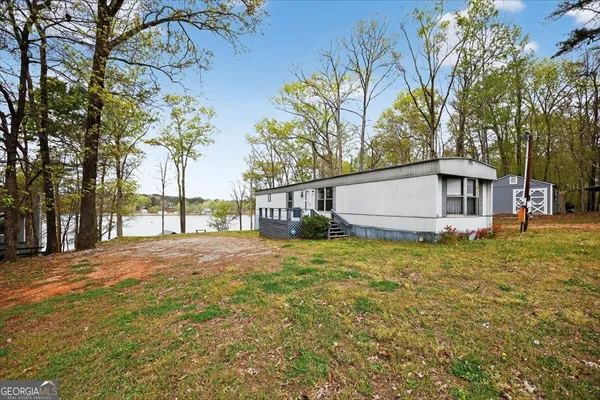 a house with trees in front of it