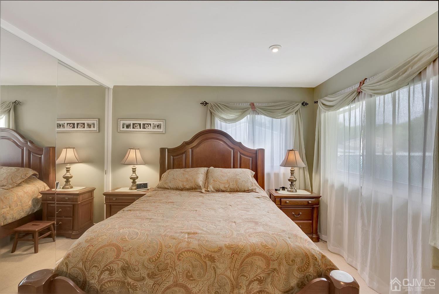 30 Savage Road Kendall Park, NJ 08824 - Photo 11 of 20 a bedroom with a bed and a window