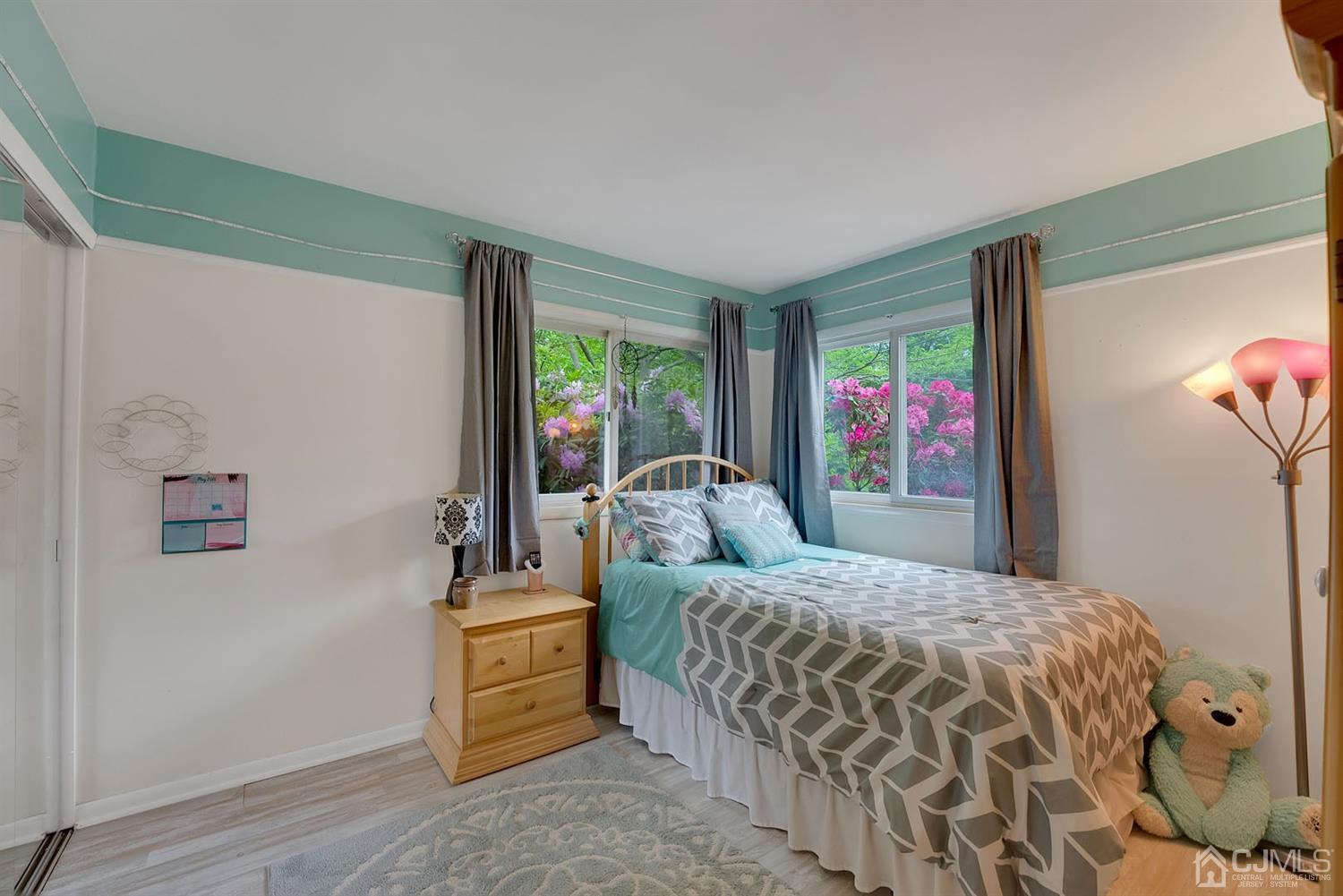 30 Savage Road Kendall Park, NJ 08824 - Photo 13 of 20 a bedroom with a bed and a dresser