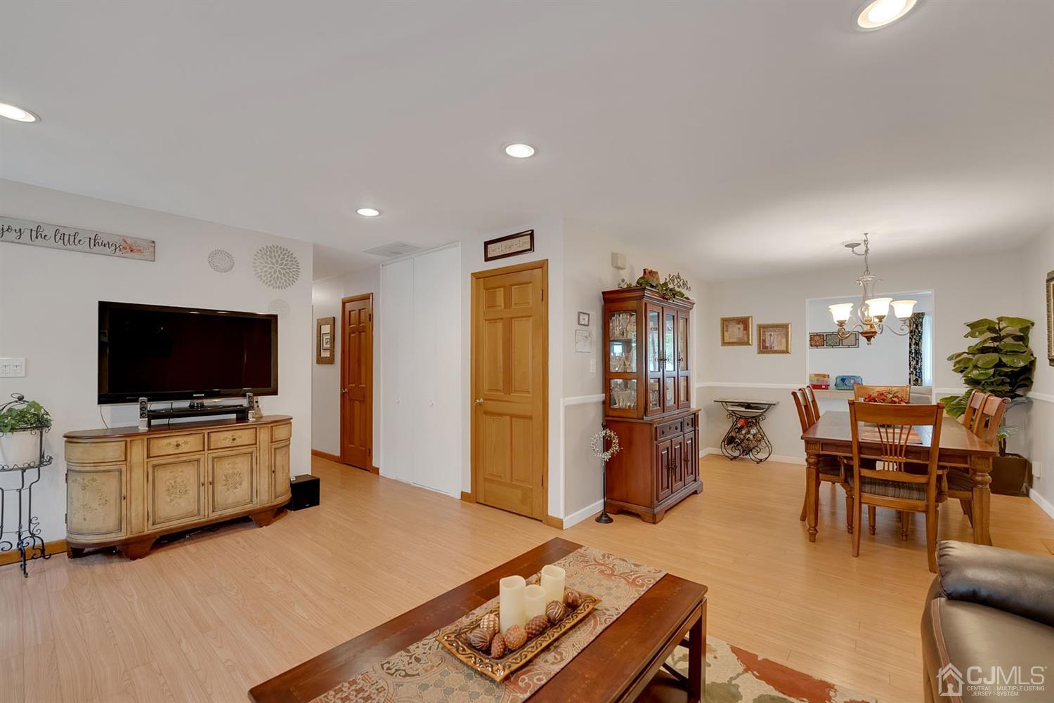30 Savage Road Kendall Park, NJ 08824 - Photo 5 of 20 a living room with furniture and a flat screen tv