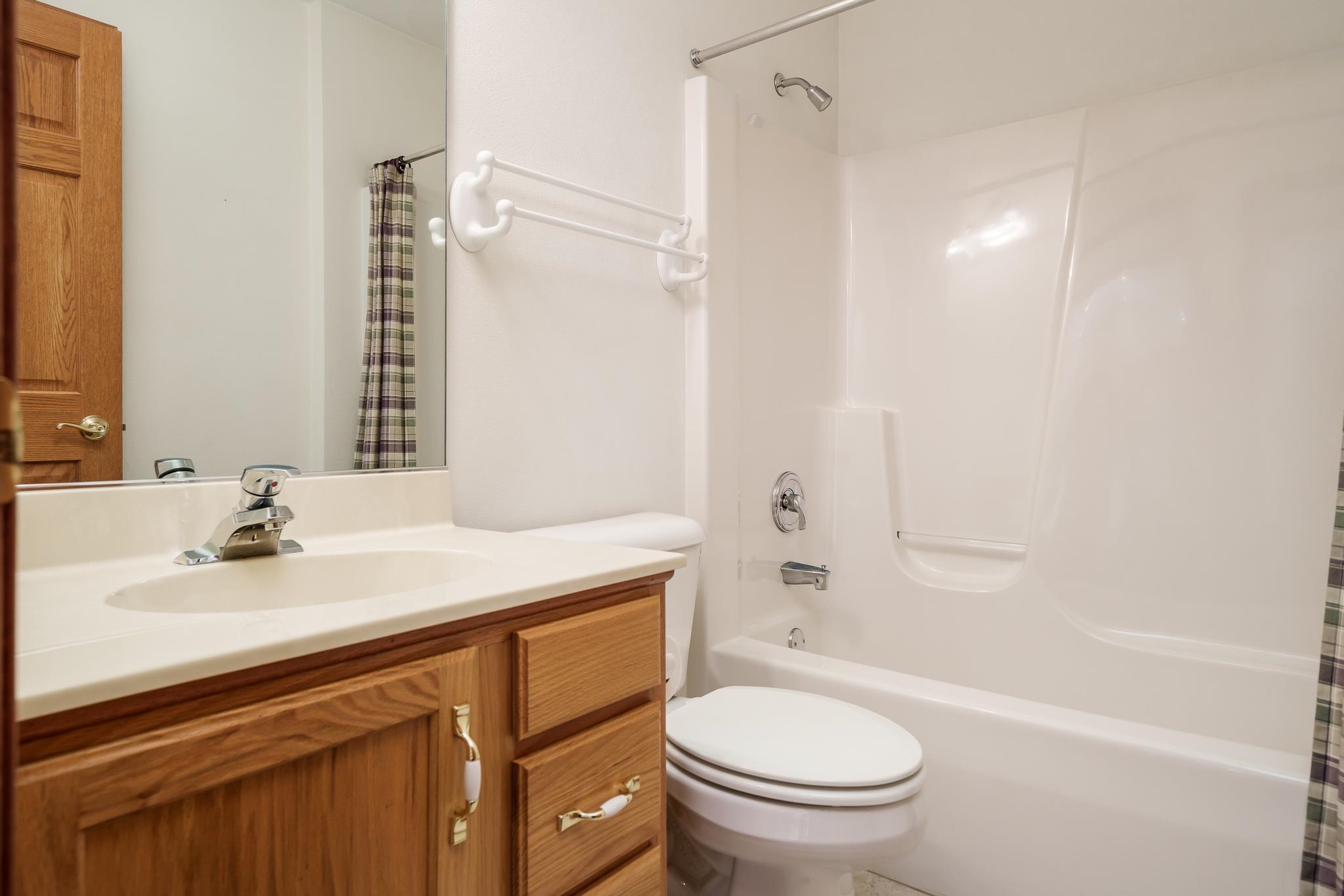261 West Redtail Lane Oregon, IL 61061 - Photo 35 of 63 a bathroom with a sink a toilet and shower