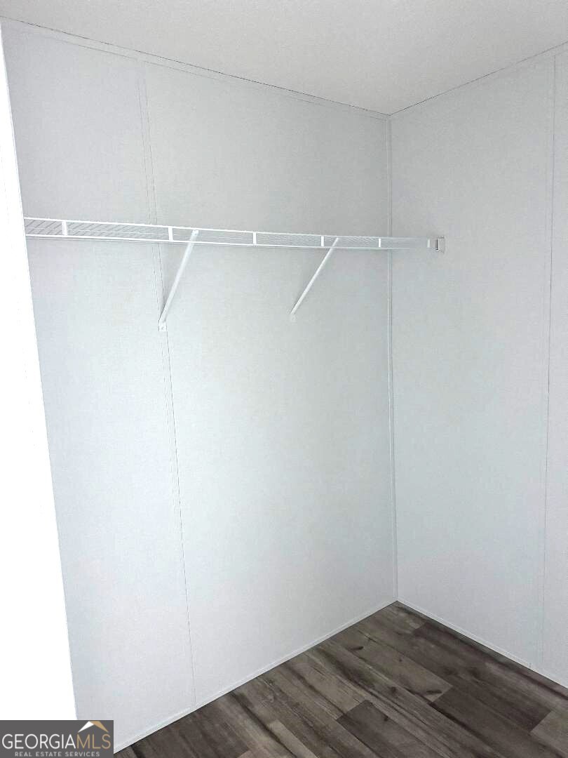 519 Wilson Road Twin City, GA 30471 - Photo 10 of 20 a view of a room with wooden floor