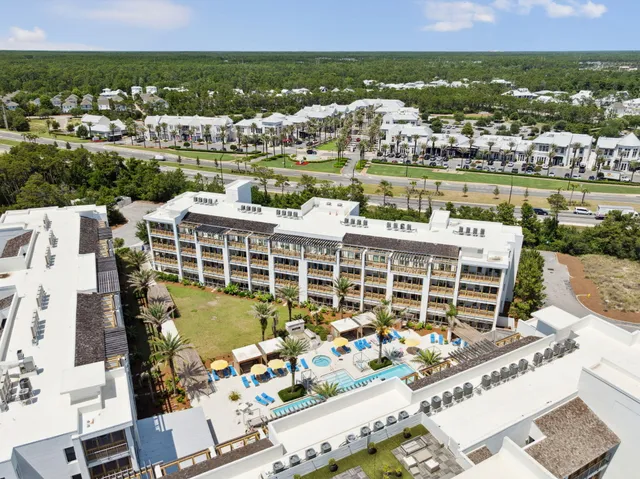 a view of a lake with tall buildings