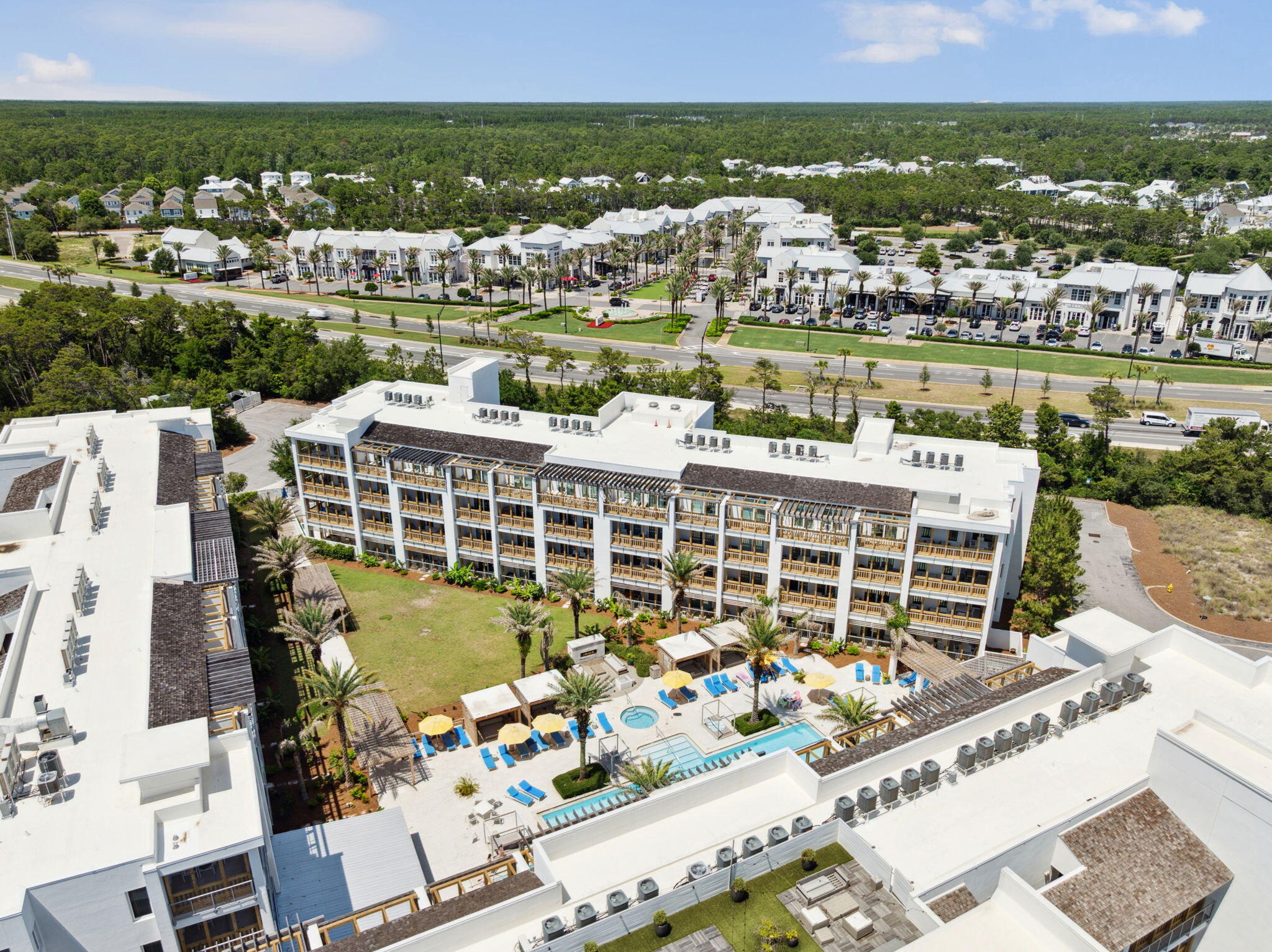 10941 East County Highway 30A, Unit 325 Inlet Beach, FL 32461 - Photo 31 of 36 a view of a lake with tall buildings