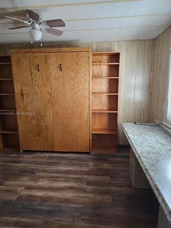 a view of an empty room with a sink