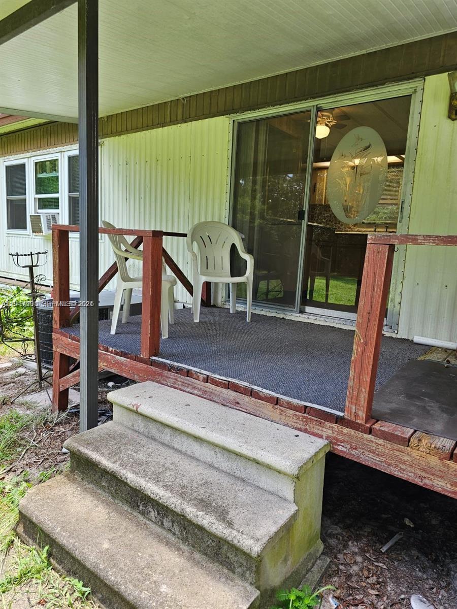 18620 Wildlife Trail, Unit 18620 Spring Hill, FL 34610 - Photo 17 of 19 a view of swimming pool with seating space