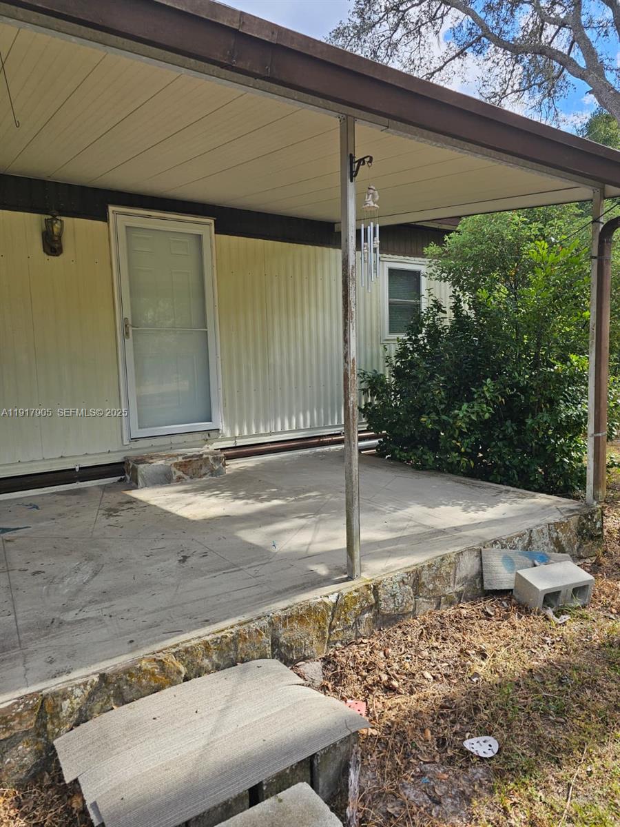 18620 Wildlife Trail, Unit 18620 Spring Hill, FL 34610 - Photo 3 of 19 a view of a house with a yard