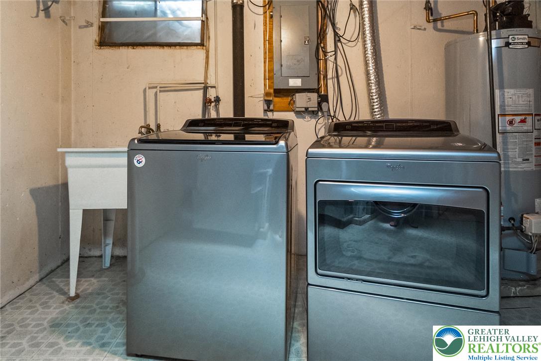 268 Apollo Drive Bethlehem, PA 18017 - Photo 40 of 56 Modern laundry appliances streamline daily tasks in this functional utility area.