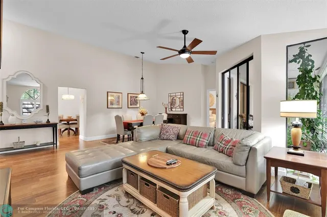 a living room with furniture and a table