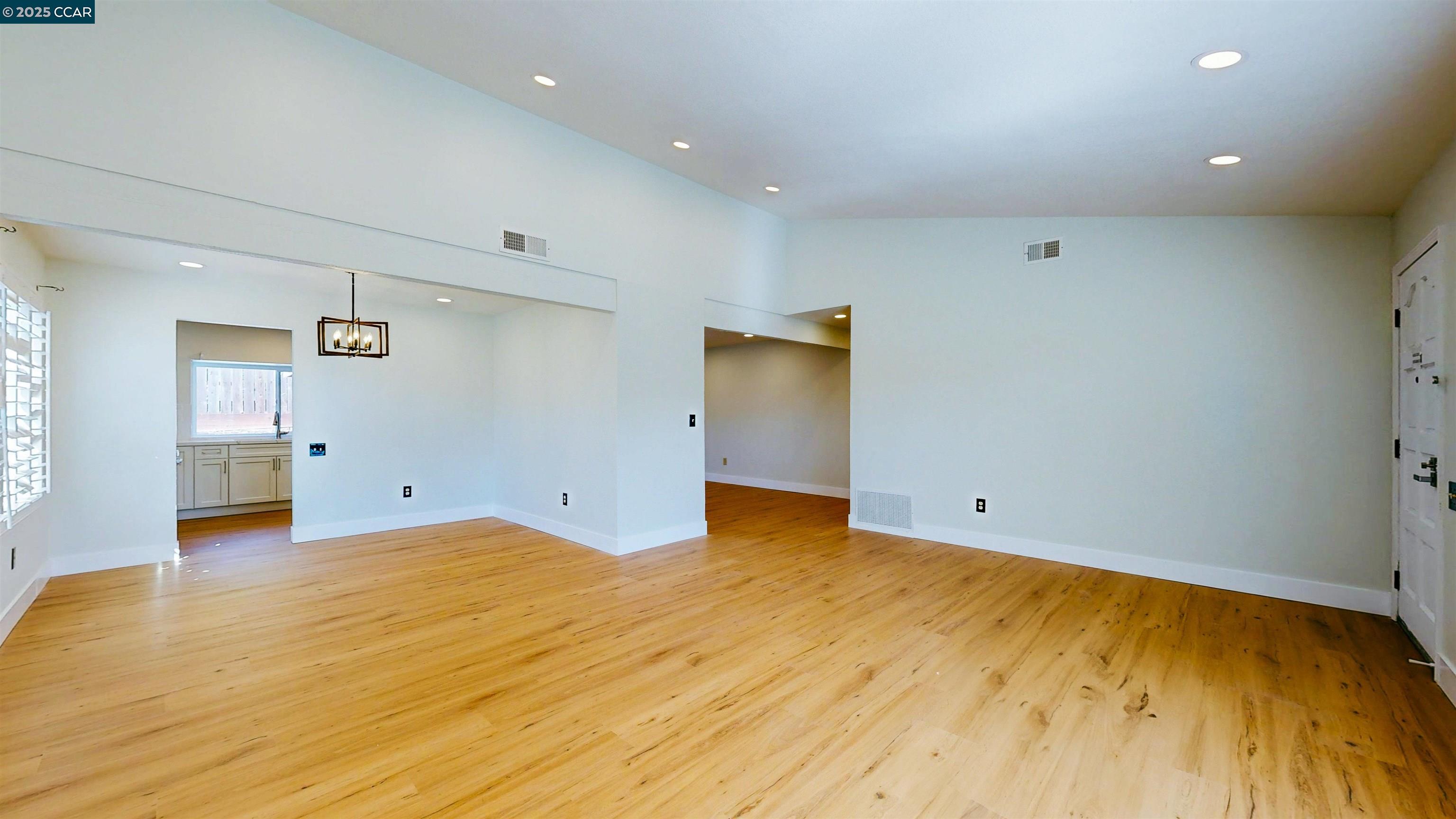 3743 Painted Pony Road Richmond, CA 94803 - Photo 11 of 56 a view of empty room with wooden floor
