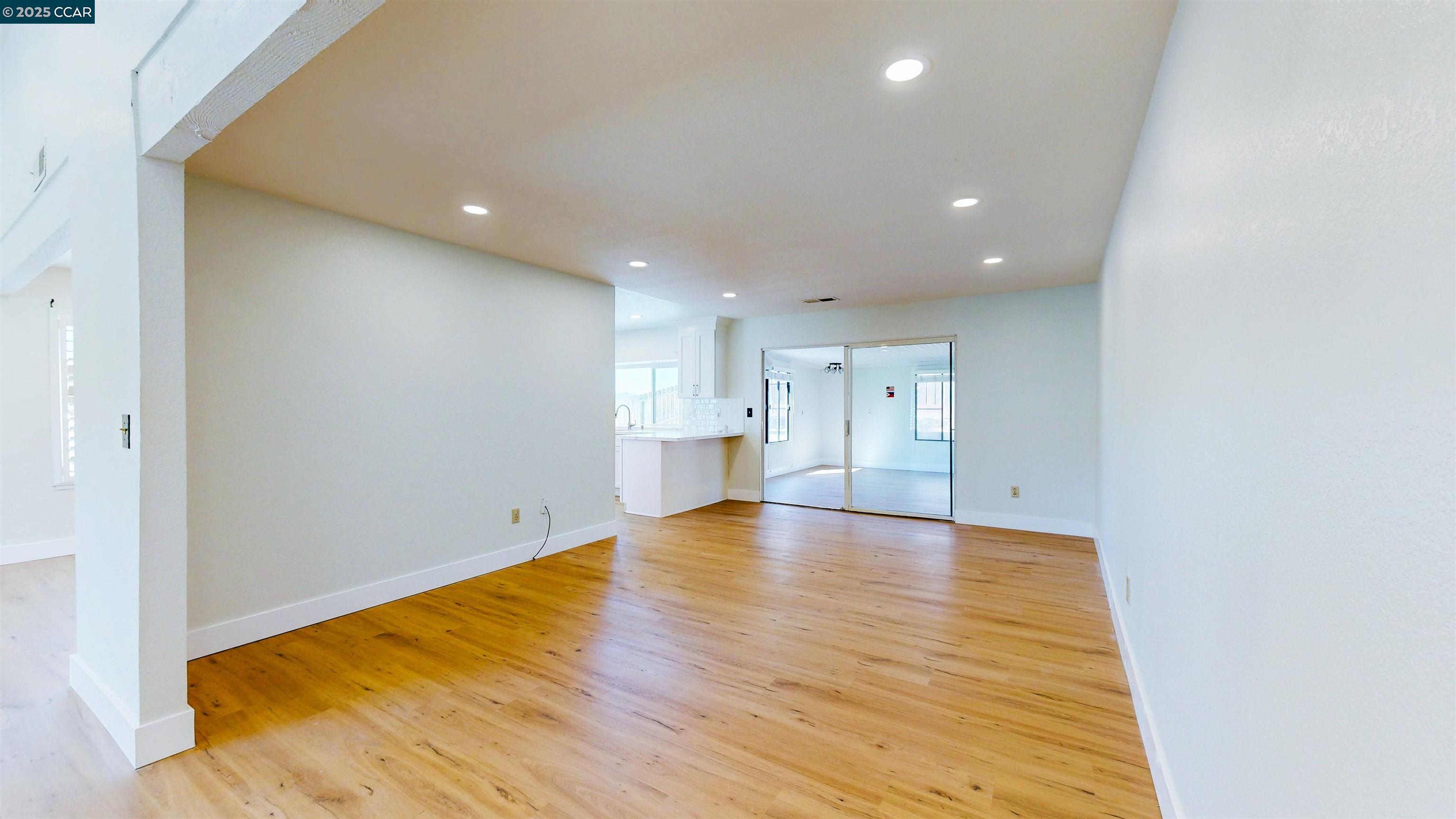 3743 Painted Pony Road Richmond, CA 94803 - Photo 18 of 56 a view of empty room with wooden floor